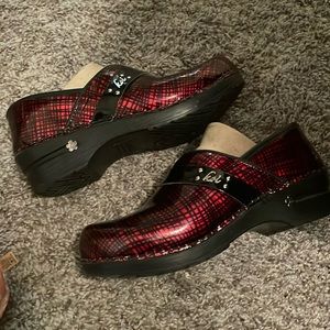 Red Santa clogs, almost new condition , worn a few times